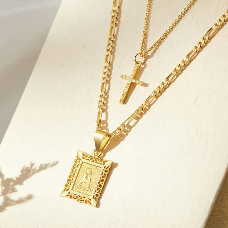 CONJUNTO CRUZ INITIALE COLLAR | ORO