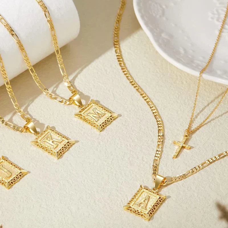 CONJUNTO CRUZ INITIALE COLLAR | ORO