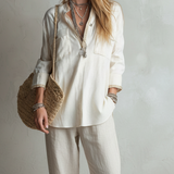 Casual Off-white Linen Shirt And Straight-leg Trousers Set.