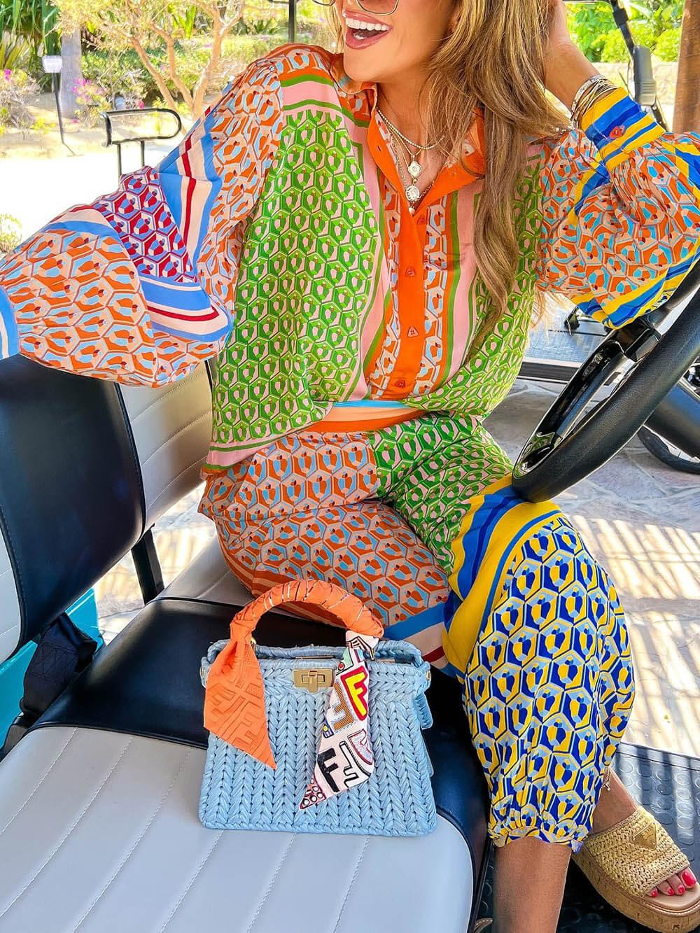 Calças Bloomer folgadas com estampa colorida exclusiva, cintura elástica e bolsos.