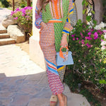 Calças Bloomer folgadas com estampa colorida exclusiva, cintura elástica e bolsos.