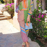 Calças Bloomer folgadas com estampa colorida exclusiva, cintura elástica e bolsos.