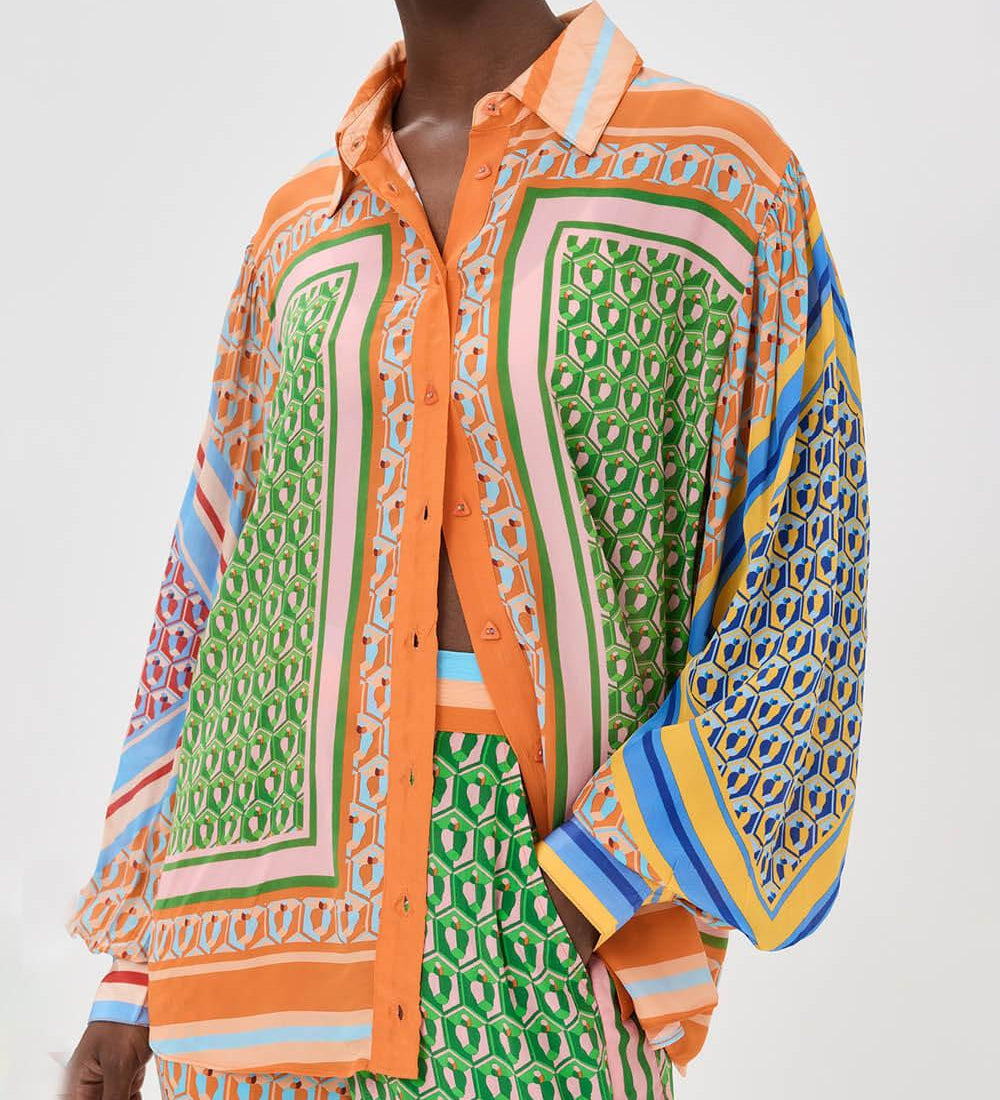 Calças Bloomer folgadas com estampa colorida exclusiva, cintura elástica e bolsos.