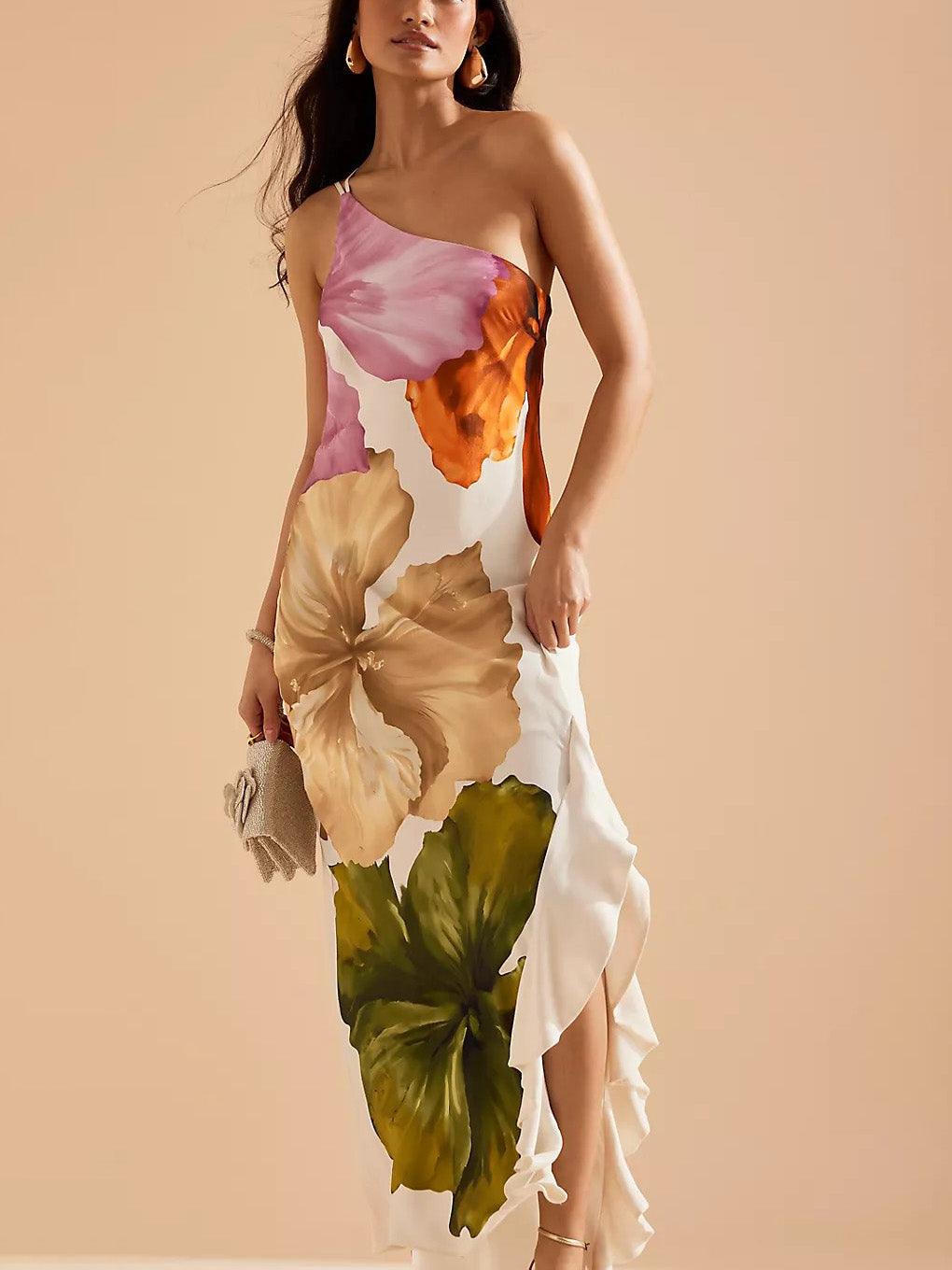 Vestido longo elegante e requintado com estampa floral e de um ombro só.