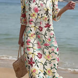 VESTIDO DE PLAYA CON BORDADO FLORAL – CORTE SUELTO