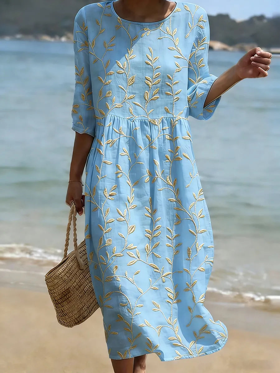 VESTIDO DE PLAYA CON BORDADO FLORAL – FLORES FRESCAS