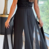 MONO DE TUL CON PANELES TEXTURIZADOS Y CUELLO REDONDO