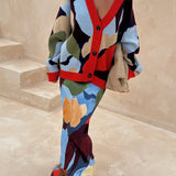 CHAQUETA DE PUNTO CON PATRÓN GEOMÉTRICO ABSTRACTO