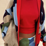 CHAQUETA DE PUNTO CON PATRÓN GEOMÉTRICO ABSTRACTO