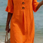 VESTIDO DE PLAYA CON BORDADO FLORAL – FLUIR NATURAL