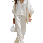 Minimalist Design Off-white Textured Suit With Batwing Sleeves.