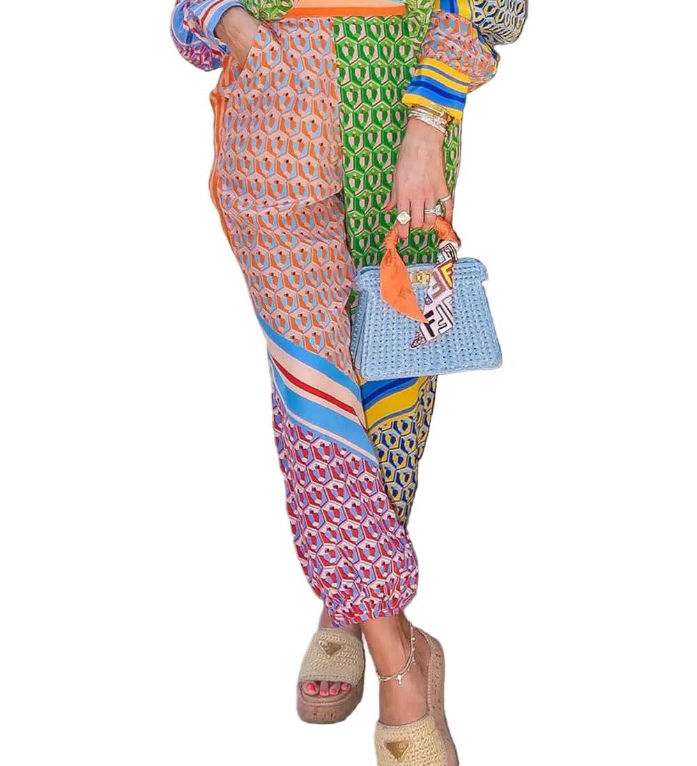 Calças Bloomer folgadas com estampa colorida exclusiva, cintura elástica e bolsos.