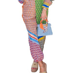 Calças Bloomer folgadas com estampa colorida exclusiva, cintura elástica e bolsos.