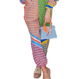 Calças Bloomer folgadas com estampa colorida exclusiva, cintura elástica e bolsos.