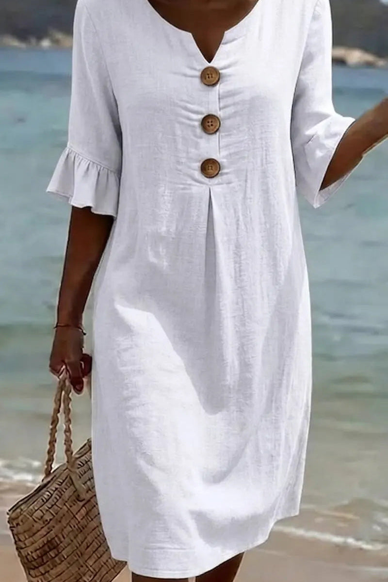 VESTIDO DE PLAYA CON BORDADO FLORAL – CORTE RELAJADO