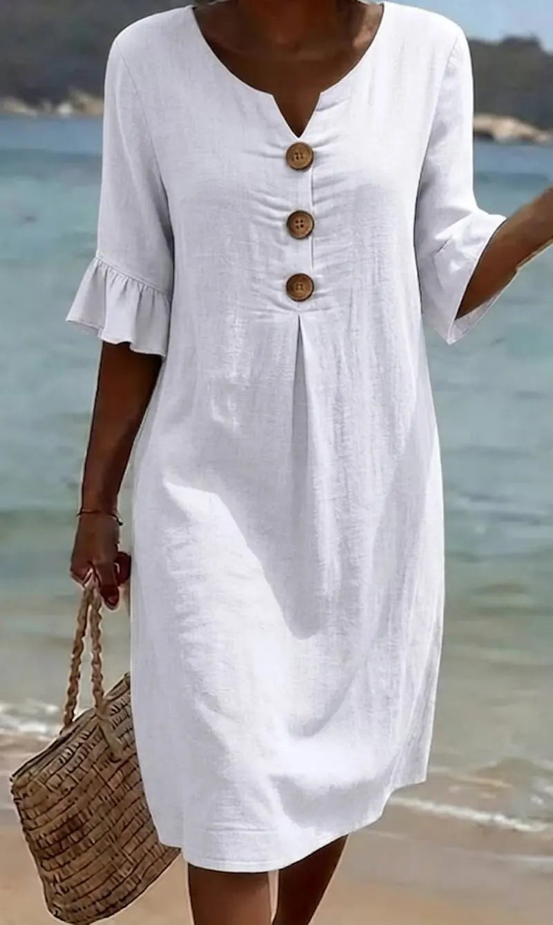 VESTIDO DE PLAYA CON BORDADO FLORAL – CORTE RELAJADO
