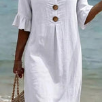 VESTIDO DE PLAYA CON BORDADO FLORAL – CORTE RELAJADO