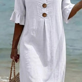 VESTIDO DE PLAYA CON BORDADO FLORAL – CORTE RELAJADO