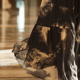 VESTIDO LARGO DE GASA CON ESTAMPADO ABSTRACTO NEGRO Y DORADO - VALERINA MARBELLA