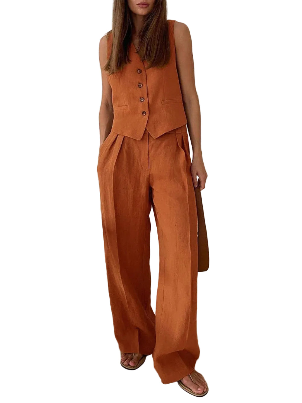 Conjunto clássico de calça pantalona com decote em V e pregas em algodão e linho.