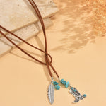 COLLAR VINTAGE BOHEMIO TURQUESA PLUMA COLGANTE SUPERPUESTO