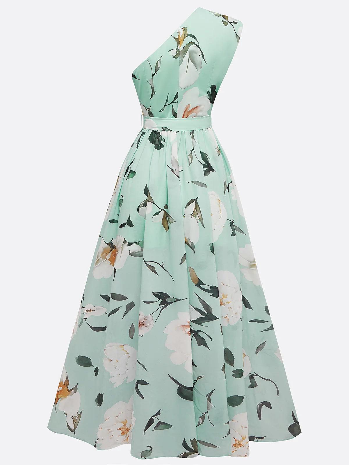 Vestido longo de chiffon verde claro com estampa floral, drapeado e um ombro só.