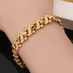PULSERA LILY ORNÉ VAGUE | ORO