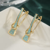 PENDIENTES DORADO SINTÉTICO GÉOMÉTRIQUE TURQUESA