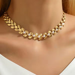 COLLAR DORADO FEUILLE PERLA