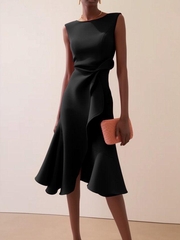 Vestido midi vermelho sem mangas, elegante, em corte A, com detalhe torcido na cintura, perfeito para usar do dia à noite.