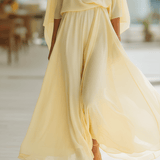 VESTIDO MAXI DE GASA AMARILLO CREMA CON MANGAS CAPA - VALERINA MARBELLA