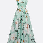 Vestido longo de chiffon verde claro com estampa floral, drapeado e um ombro só.