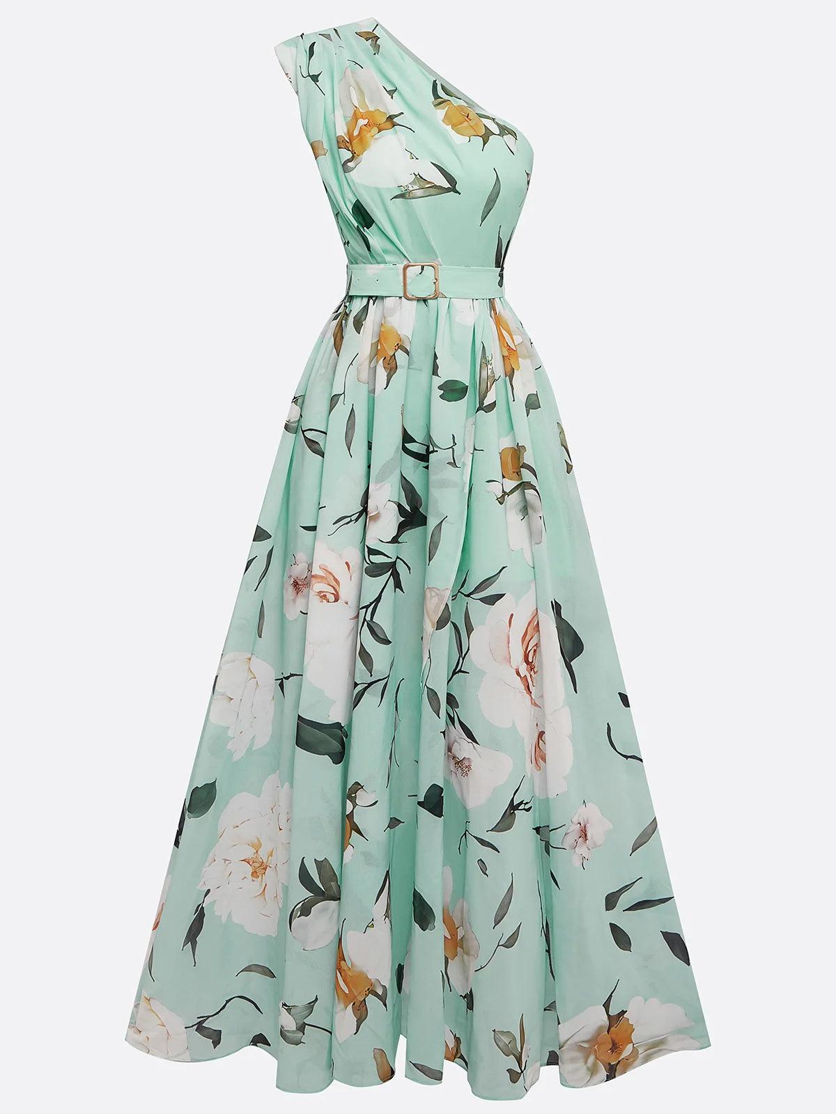 Vestido longo de chiffon verde claro com estampa floral, drapeado e um ombro só.