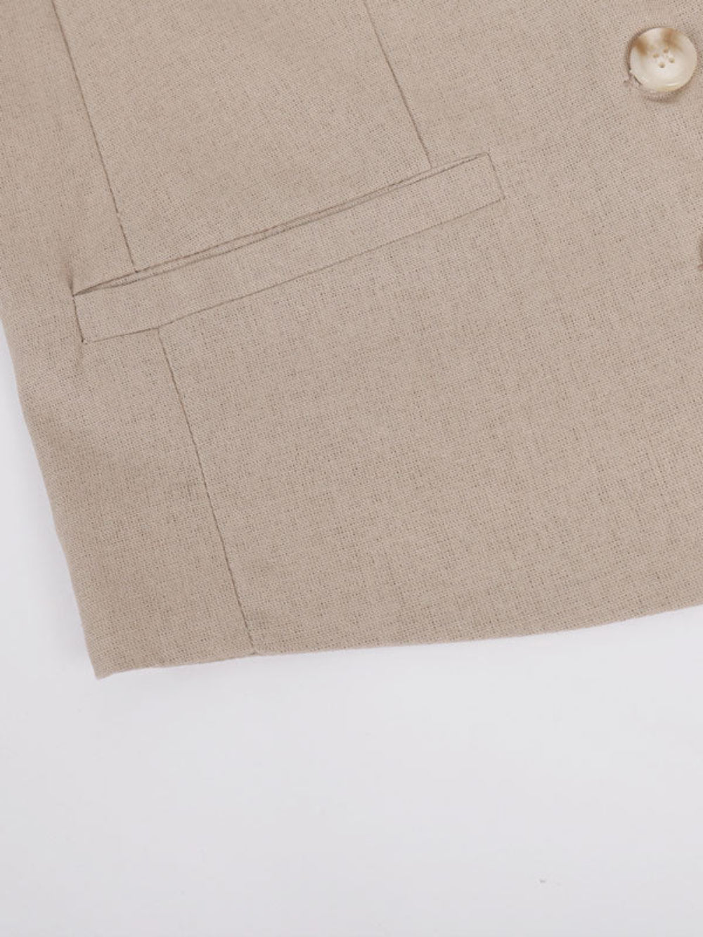 Conjunto clássico de calça pantalona com decote em V e pregas em algodão e linho.