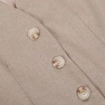 Conjunto clássico de calça pantalona com decote em V e pregas em algodão e linho.