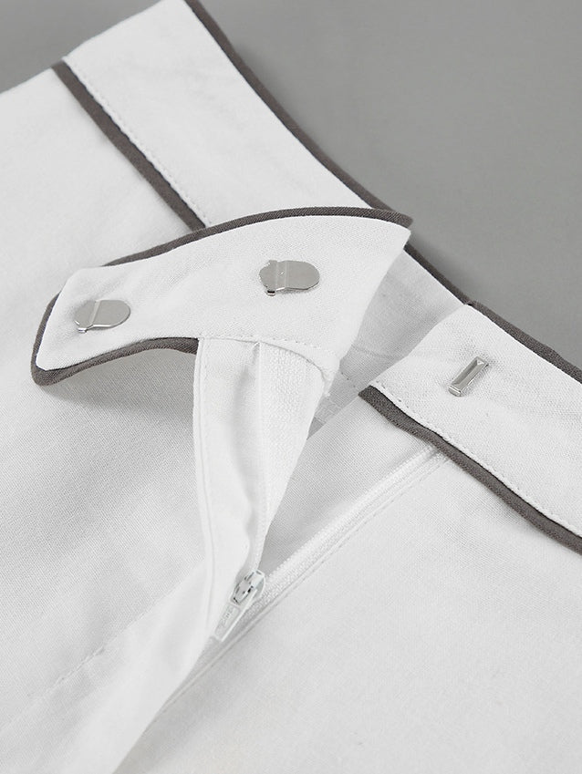 Conjunto de duas peças em algodão e linho com camisa e shorts em contraste preto e branco