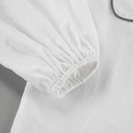 Conjunto de duas peças em algodão e linho com camisa e shorts em contraste preto e branco