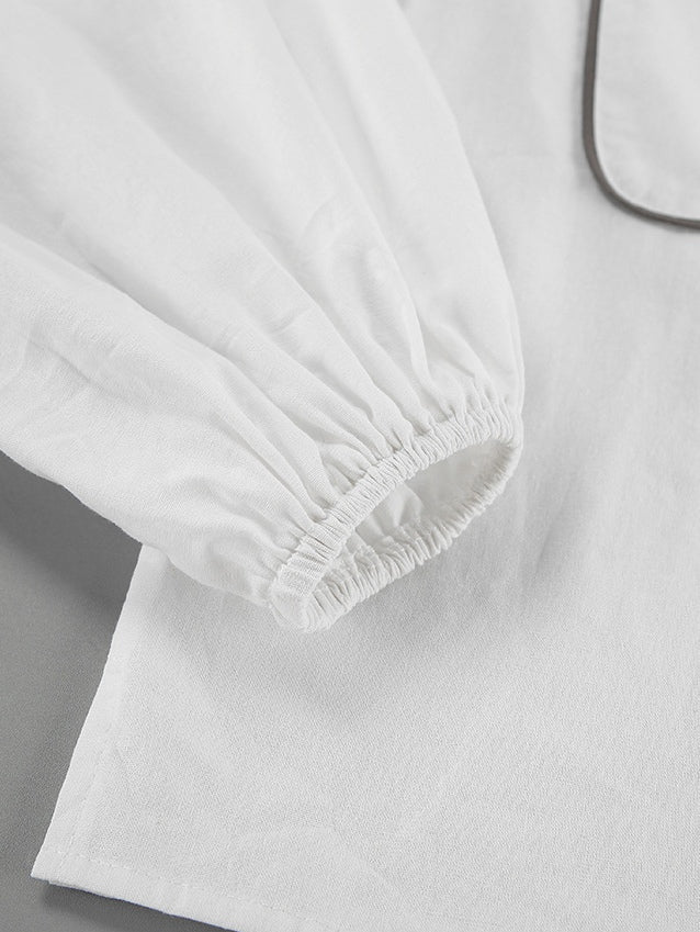 Conjunto de duas peças em algodão e linho com camisa e shorts em contraste preto e branco