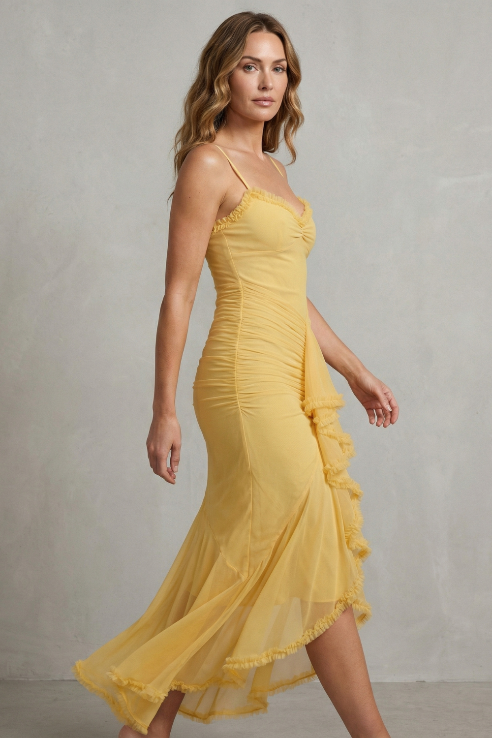 Phoebe – Feminine ruffle allure – Sleeveless high low maxi dress