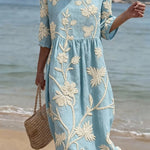 VESTIDO DE PLAYA CON BORDADO FLORAL – TACTO SUAVE