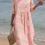 VESTIDO DE PLAYA CON BORDADO FLORAL – CAÍDA FRESCA