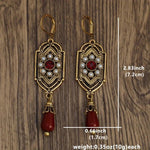 PENDIENTES ART DECO ORO GRANATE & PERLA GOTA