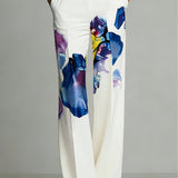 Conjunto de blusa de gola redonda e calça com estampa parcial em blocos de cores