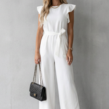 Virelle – Ruffle sleeve belted – Wide-leg jumpsuit