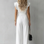 Virelle – Ruffle sleeve belted – Wide-leg jumpsuit