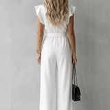 Virelle – Ruffle sleeve belted – Wide-leg jumpsuit