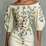 VESTIDO FLORAL CON MANGAS MEDIAS Y ABERTURA