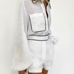 Conjunto de duas peças em algodão e linho com camisa e shorts em contraste preto e branco