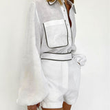 Conjunto de duas peças em algodão e linho com camisa e shorts em contraste preto e branco