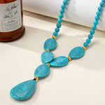 COLLAR BOHEMIO GÉOMÉTRIQUE LARME REDONDO TURQUESA PERLÉ